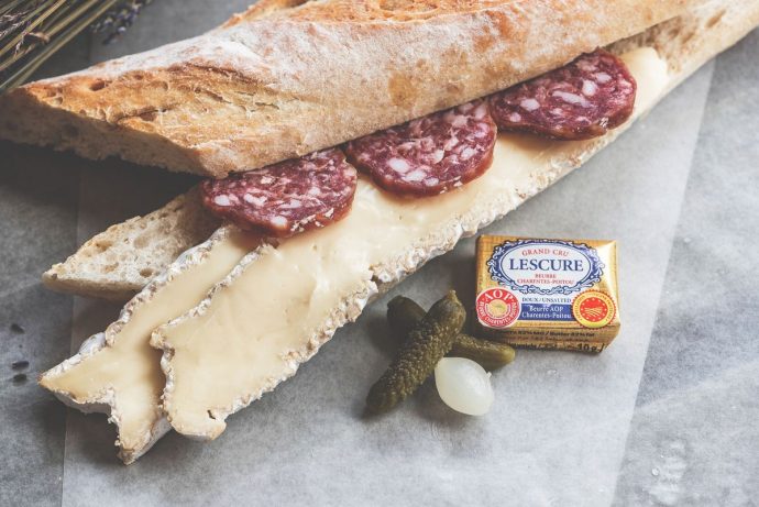 A Salami baguette with butter, group catering and accommodation