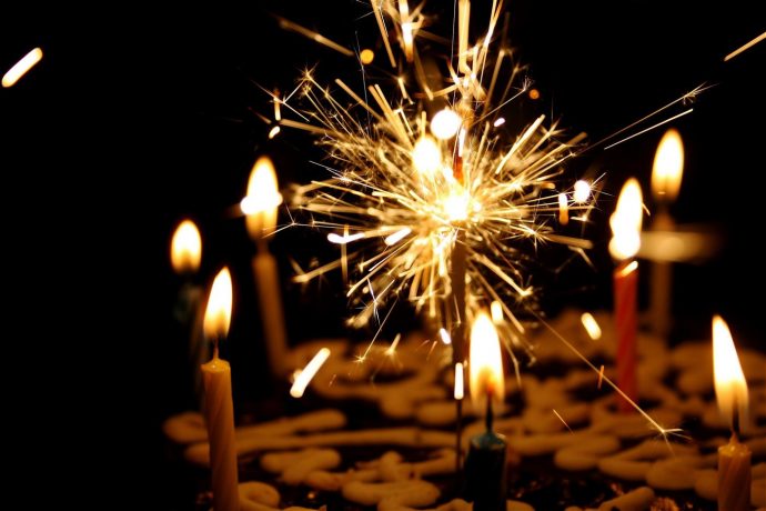A candle on a birthday cake, celebrating special occasions on the French Riviera